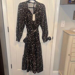 Vivetta NWT black and white dress with belt size 42
Retails at $675